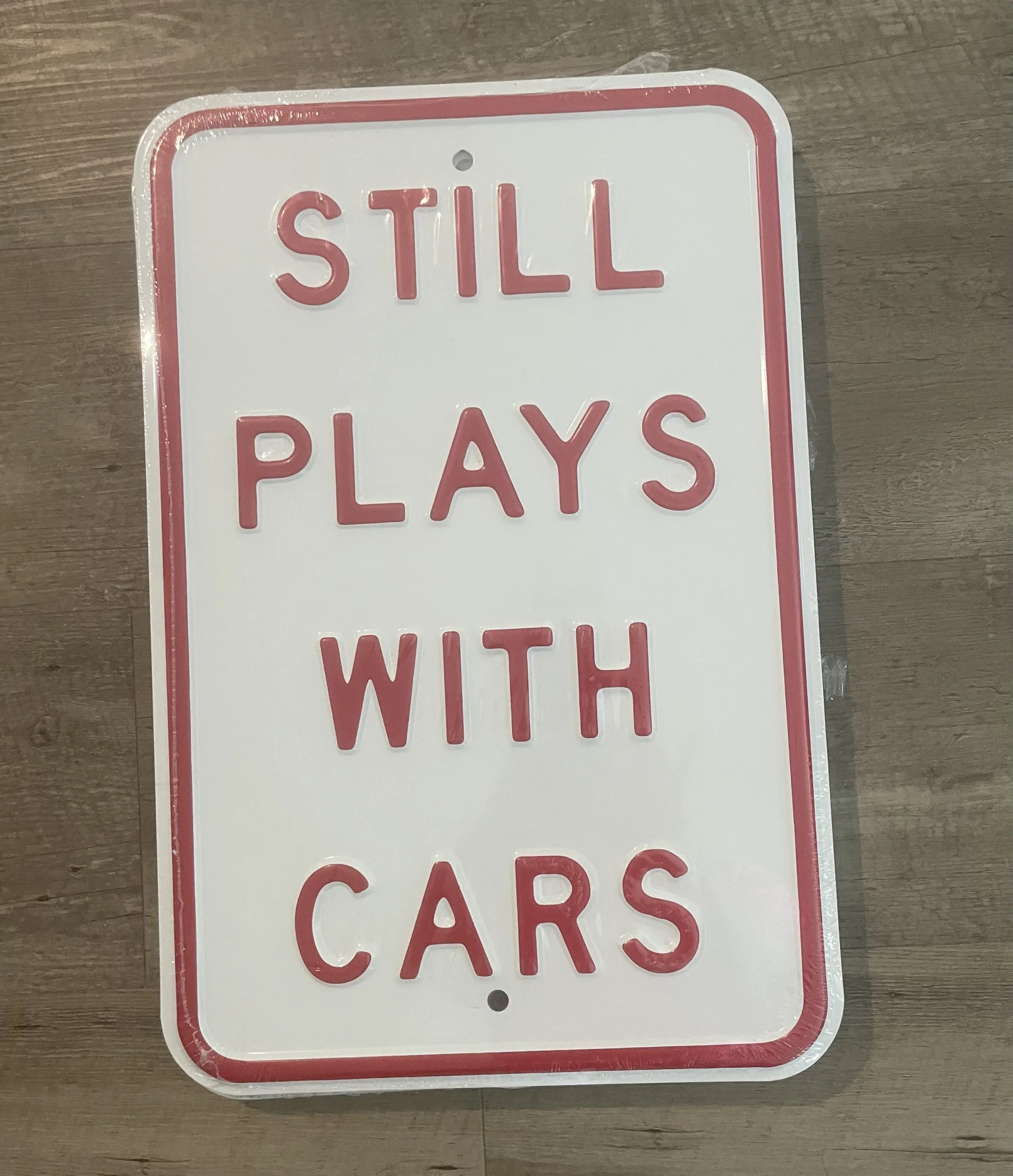 Still Plays With Cars - Automotive Metal Sign